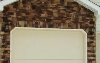 Stone masonry accent exterior garage