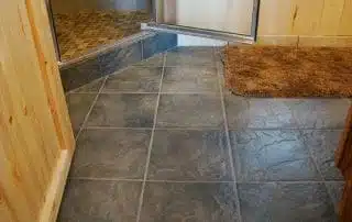 Close-up of tile work on bathroom floor