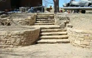 Multi level stairway in between retainer walls