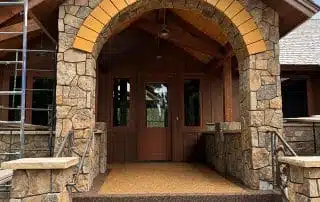 stone masonry work custom design on exterior entry of house
