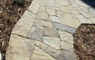 rock pathway leading up to house